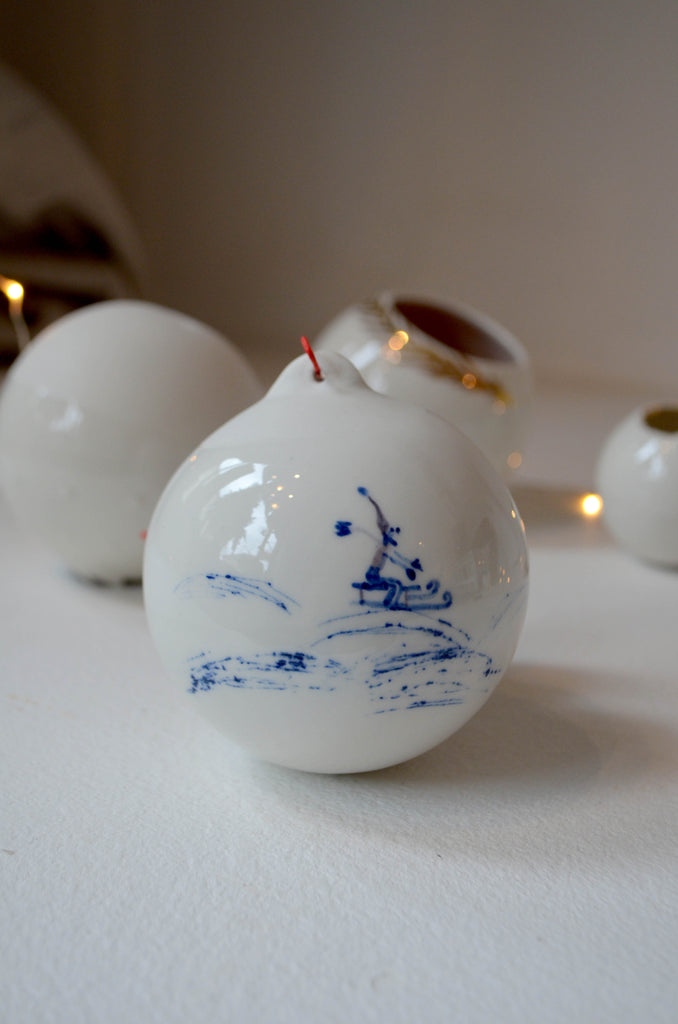 Porcelain hand painted bauble skier