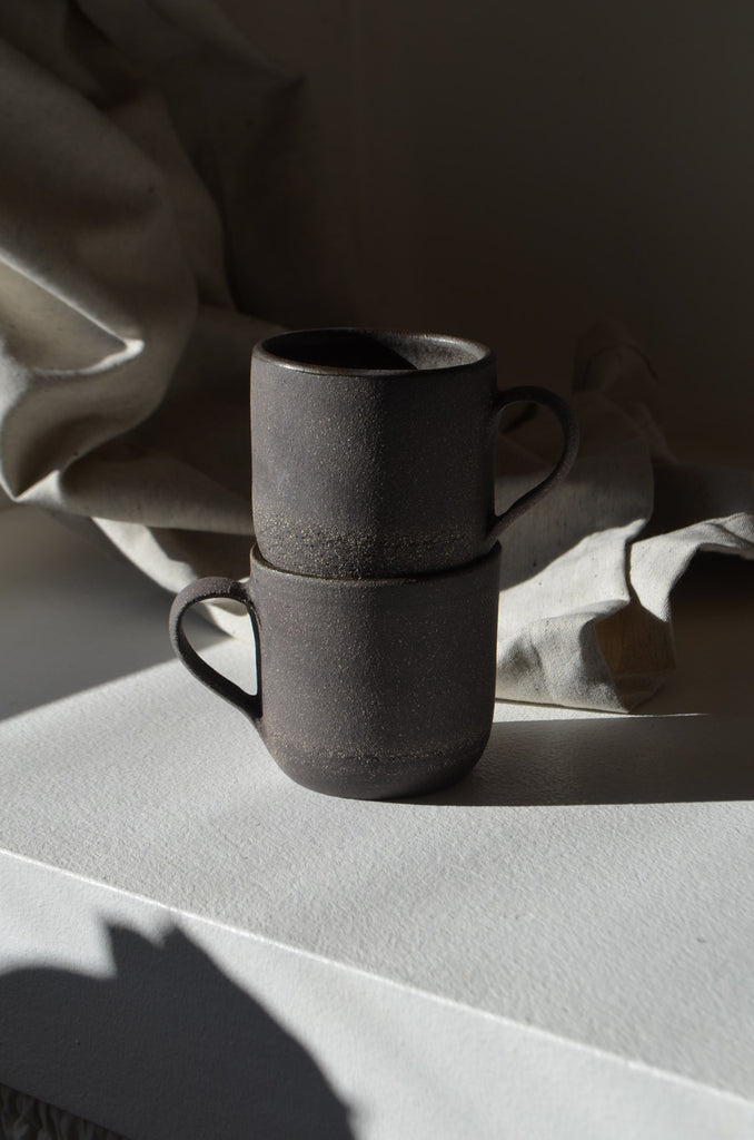 gray matte wheel thrown cups in stoneware clay