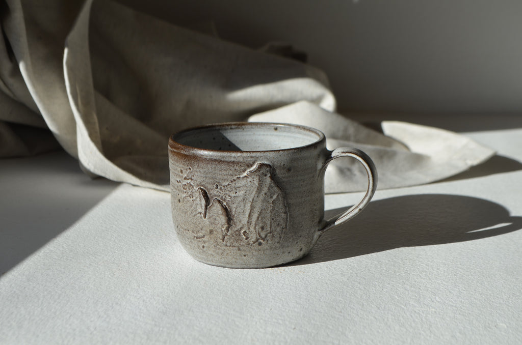 textured wheel thrown gray mug