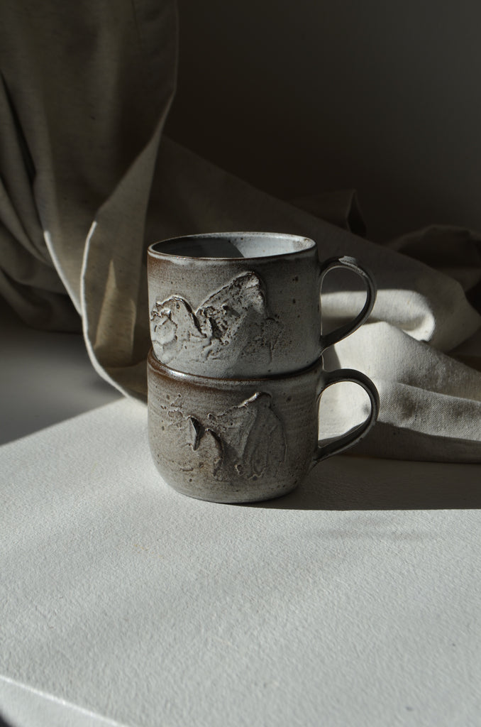 textured gray stoneware mugs