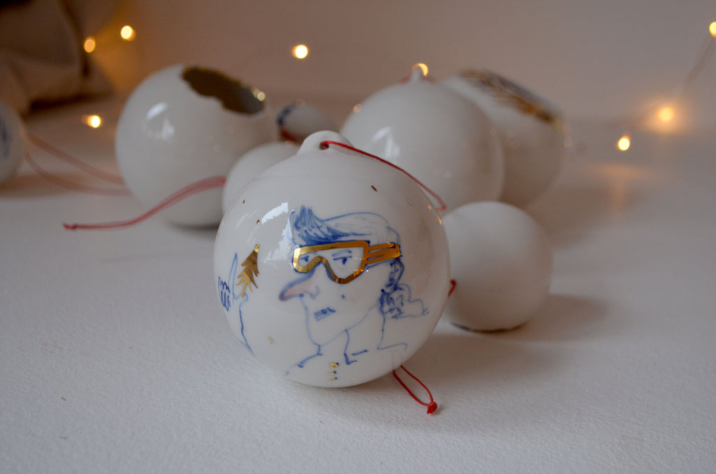 Christmas bauble with skiing instructor portrait